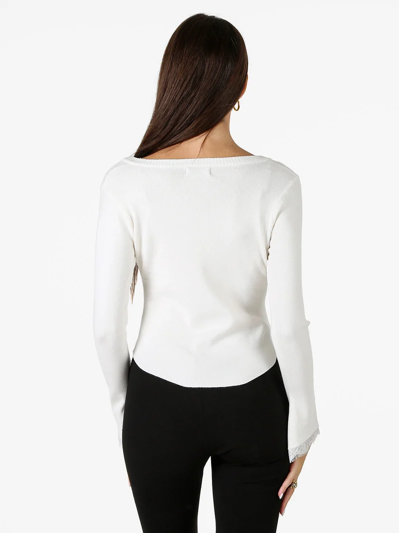 Cardigan donna in maglia con bottoni e maniche a campana con dettagli in pizzo - bianco