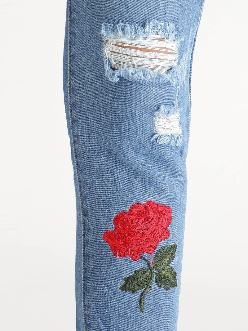 Jeans boyfriend strappati con ricami fiorati - jeans