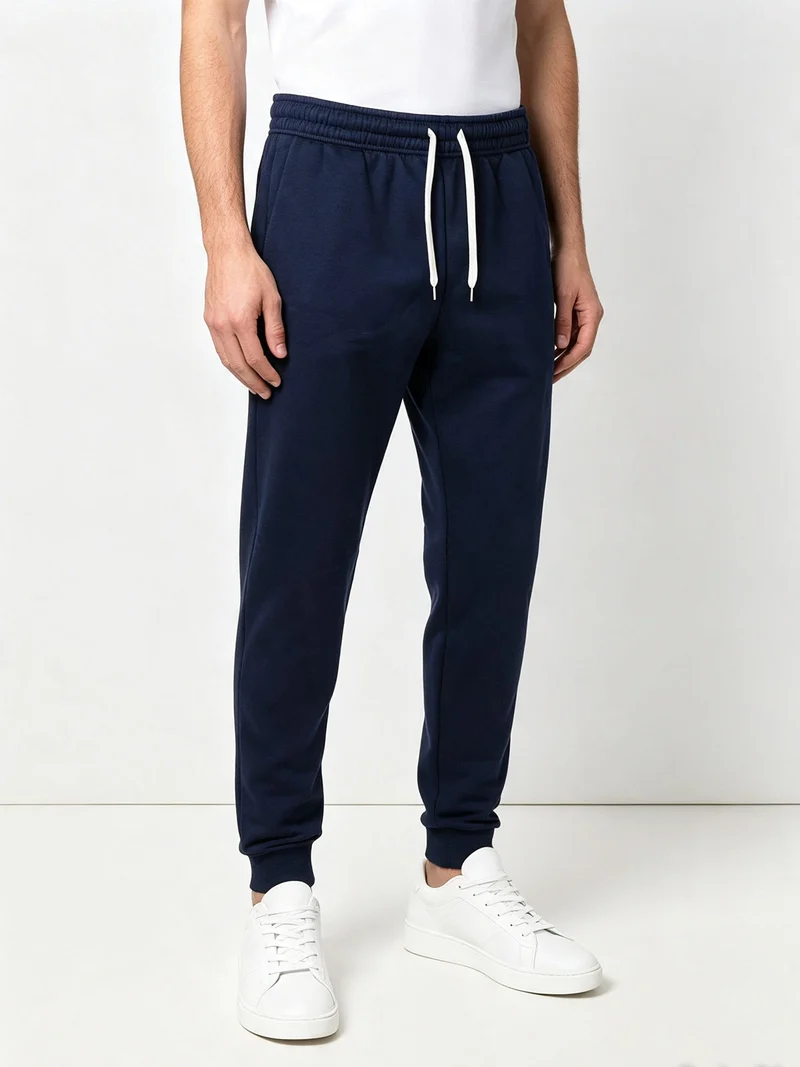 Pantaloni sportivi da uomo con polsini e interno felpato - blu scuro