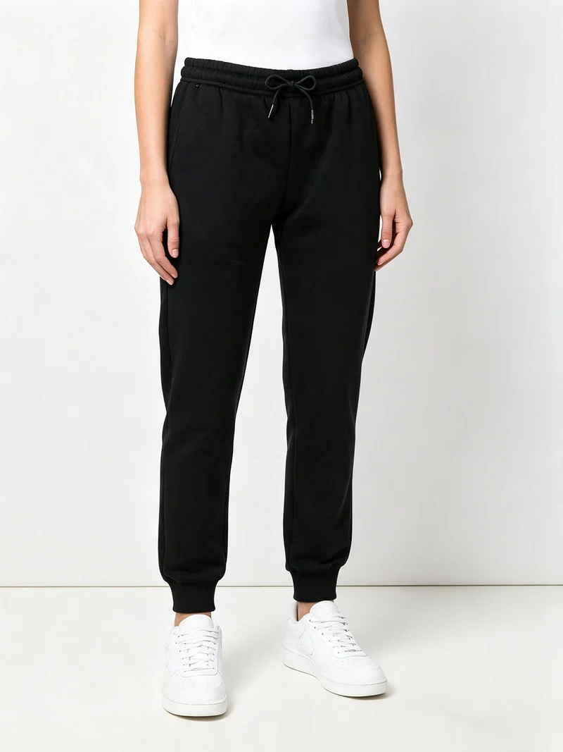 Pantaloni sportivi da donna con polsini e coulisse - nero