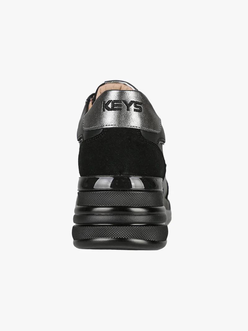 Sneakers donna in pelle con zeppa - nero