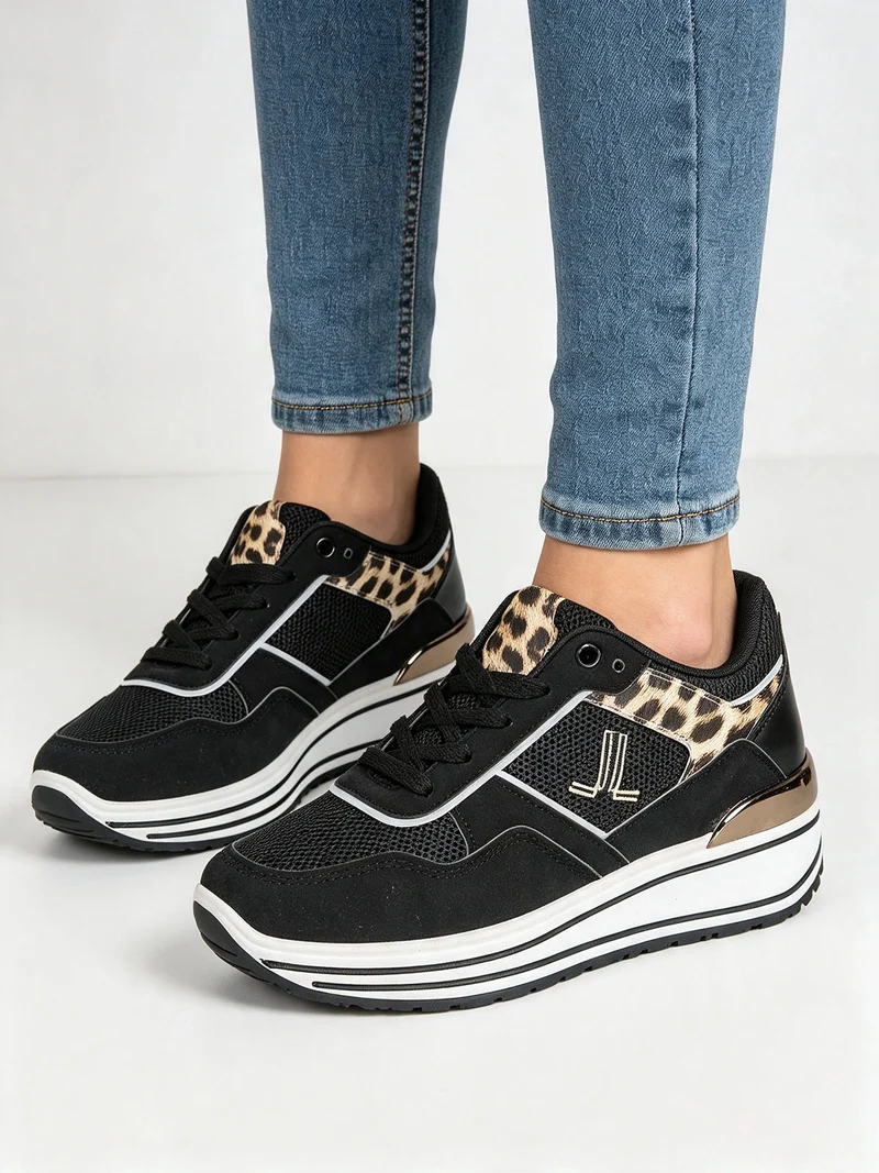 Sneakers donna con zeppa e dettagli animalier - nero