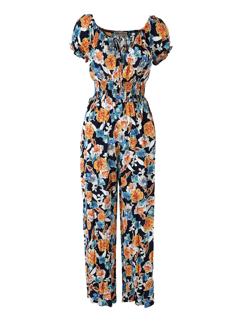 Tuta jumpsuite da donna con stampa floreale e maniche corte - blu scuro