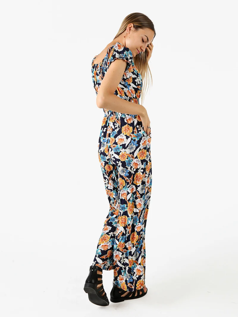 Tuta jumpsuite da donna con stampa floreale e maniche corte - blu scuro