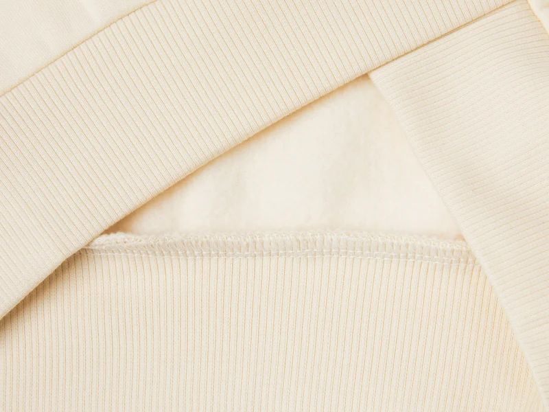 Sweater mit Reißverschluss und Pailletten