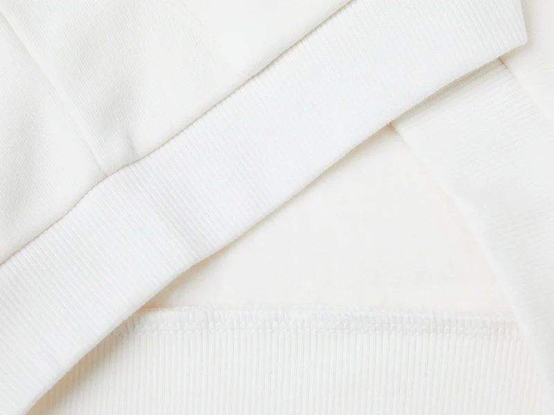 Sweater mit Reißverschluss und Pailletten