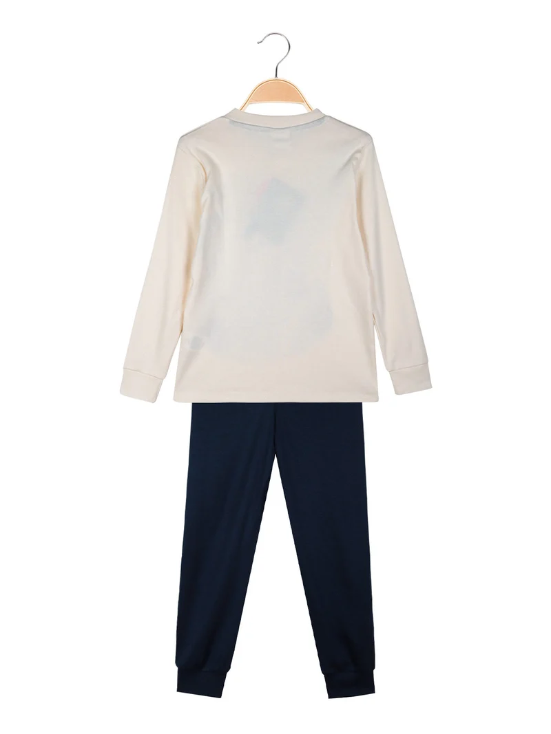 Pigiama lungo da bambino in cotone interlock - panna