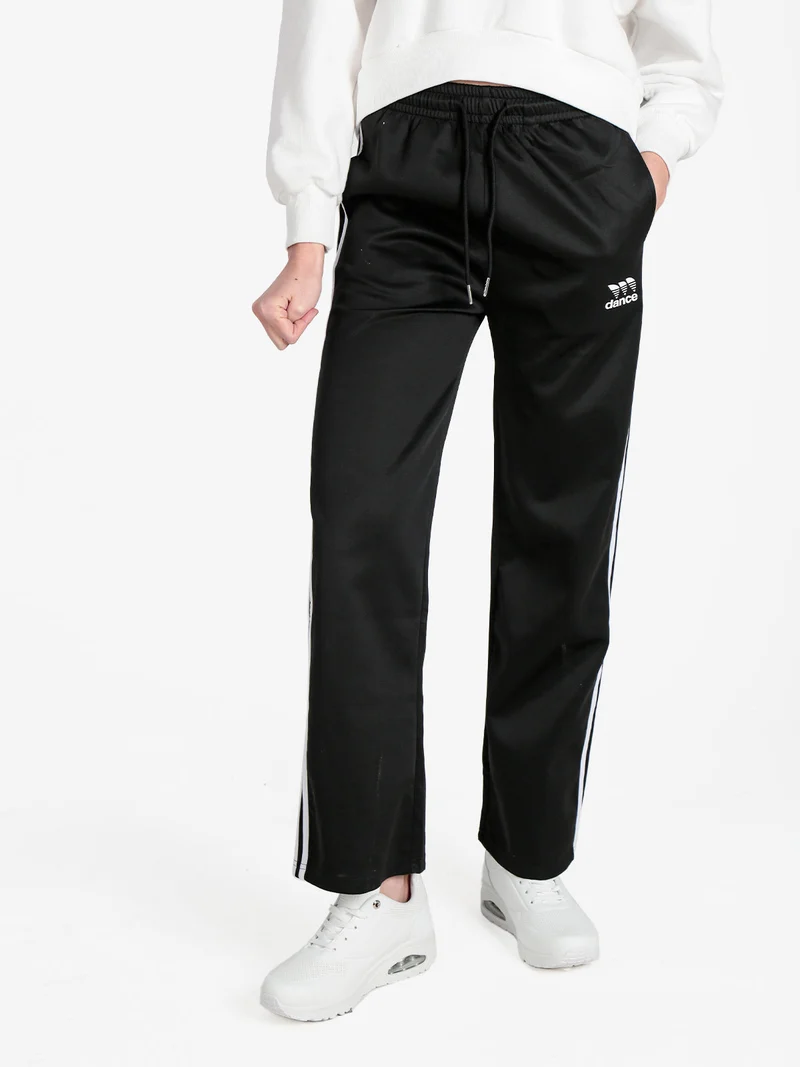 Pantaloni tuta da donna con strisce laterali - nero