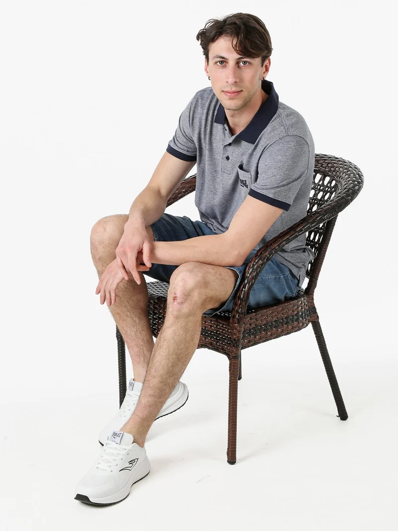 Polo da uomo in cotone a maniche corte con taschino - blu scuro
