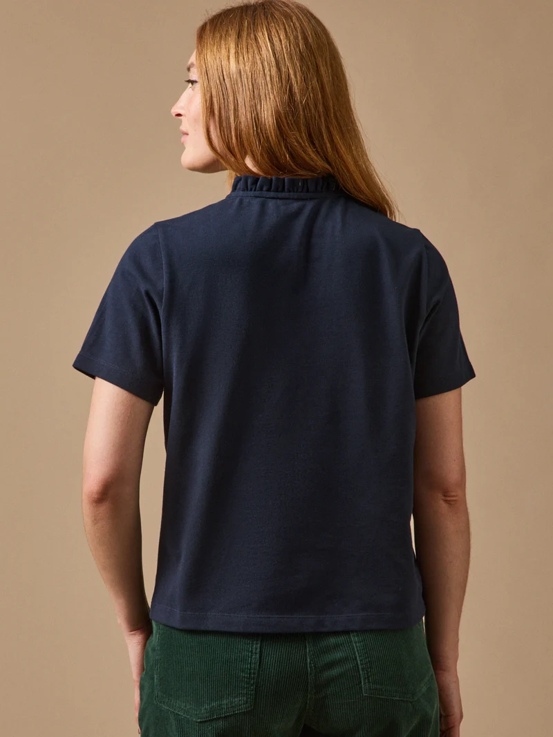 Damen-Poloshirt mit Volants am Kragen