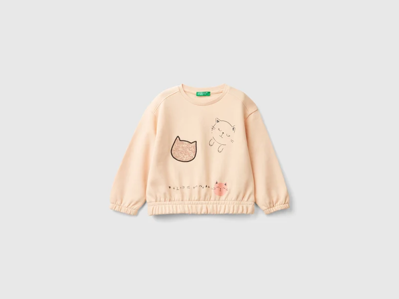 Sweater mit Druck und Pailletten
