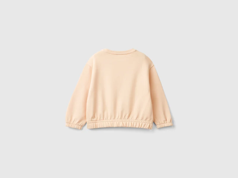 Sweater mit Druck und Pailletten