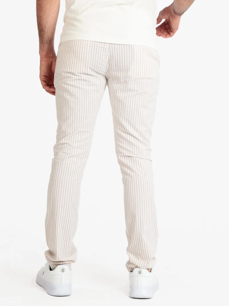 Pantaloni rigati in cotone con coulisse da uomo - beige