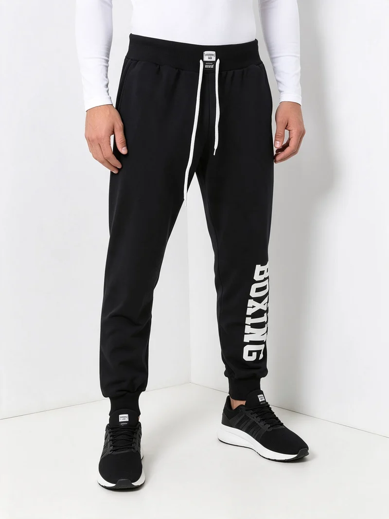 Pantaloni tuta da uomo in cotone con coulisse e logo - blu scuro