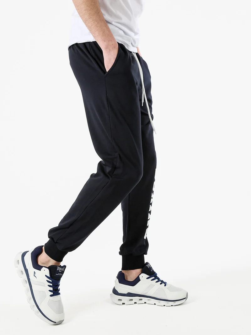 Pantaloni tuta da uomo in cotone con coulisse e logo - blu scuro