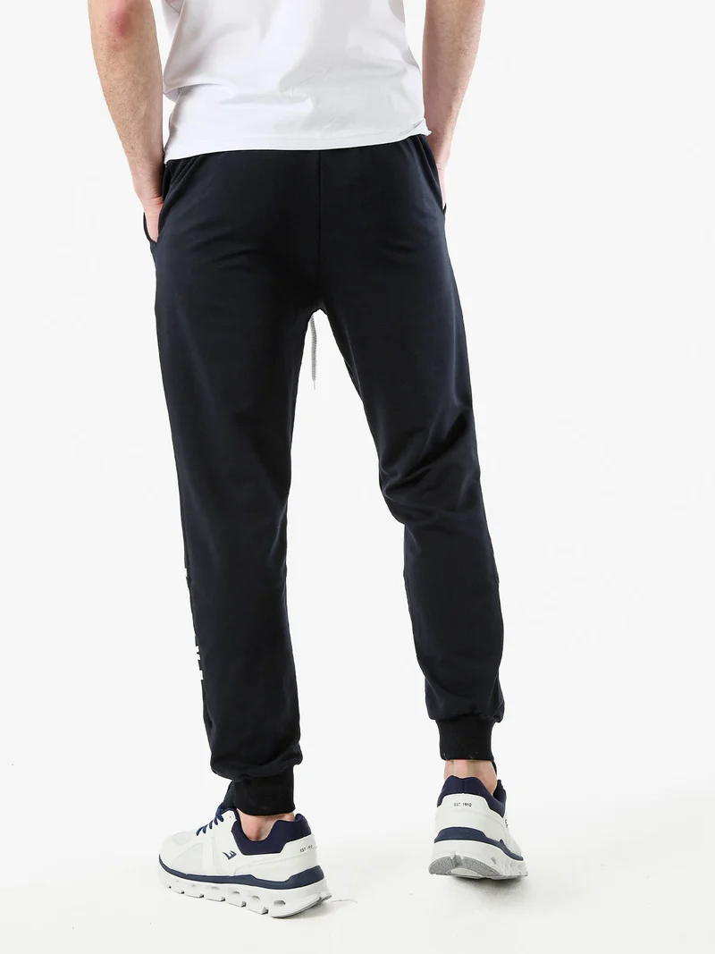 Pantaloni tuta da uomo in cotone con coulisse e logo - blu scuro