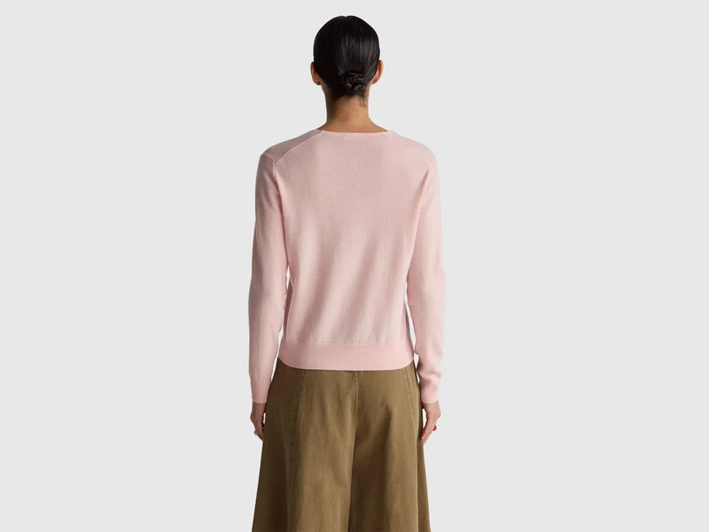 Puderrosa Pullover mit V-Ausschnitt aus reiner Merinowolle