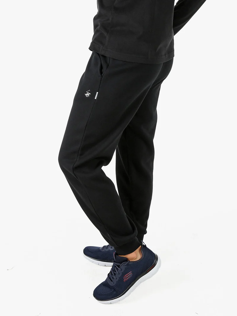 Pantaloni tuta da uomo felpati con polsini - nero