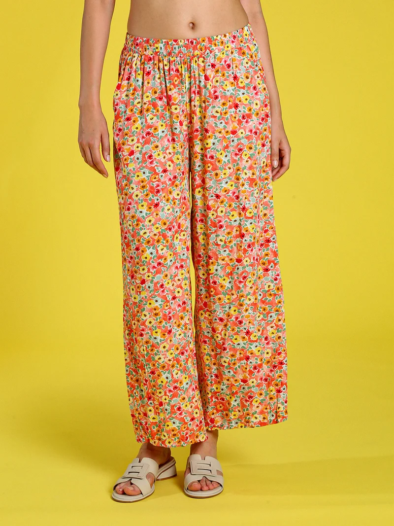 Pantaloni donna floreali a gamba larga in cotone - arancione