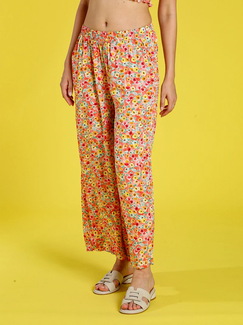 Pantaloni donna floreali a gamba larga in cotone - arancione
