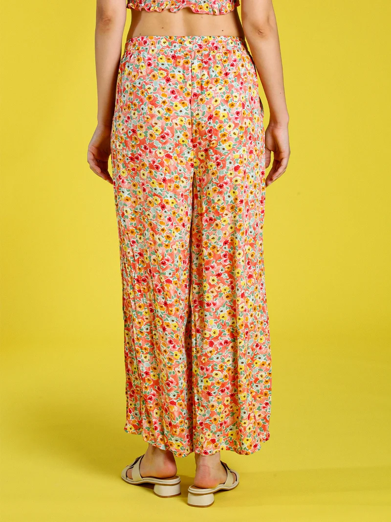 Pantaloni donna floreali a gamba larga in cotone - arancione