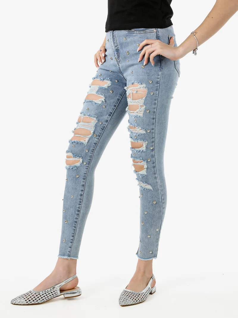 Jeans donna skinny con borchie e strappi - jeans