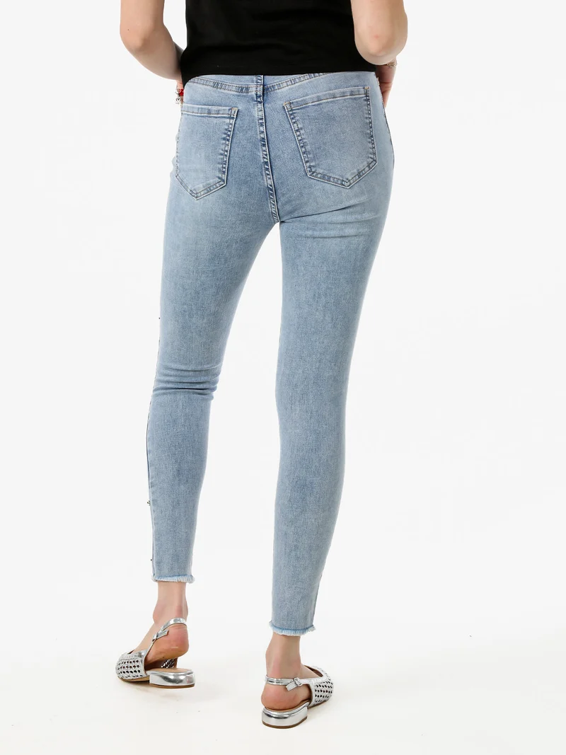 Jeans donna skinny con borchie e strappi - jeans