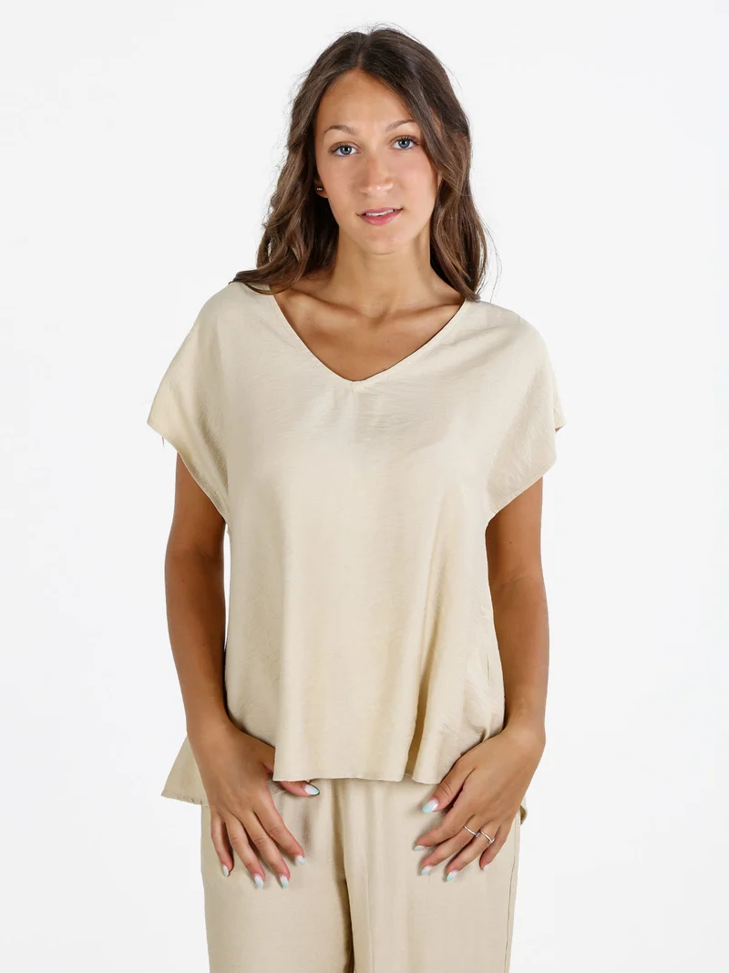 Blusa donna senza maniche con scollo a V - beige