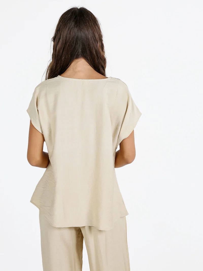 Blusa donna senza maniche con scollo a V - beige