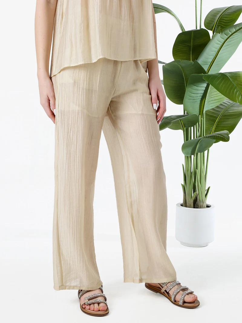 Pantaloni donna leggeri a gamba larga - beige