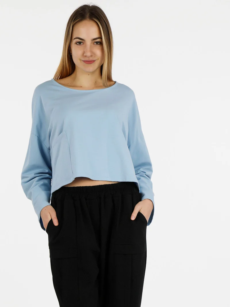 T-shirt cropped da donna con tasca - azzurro