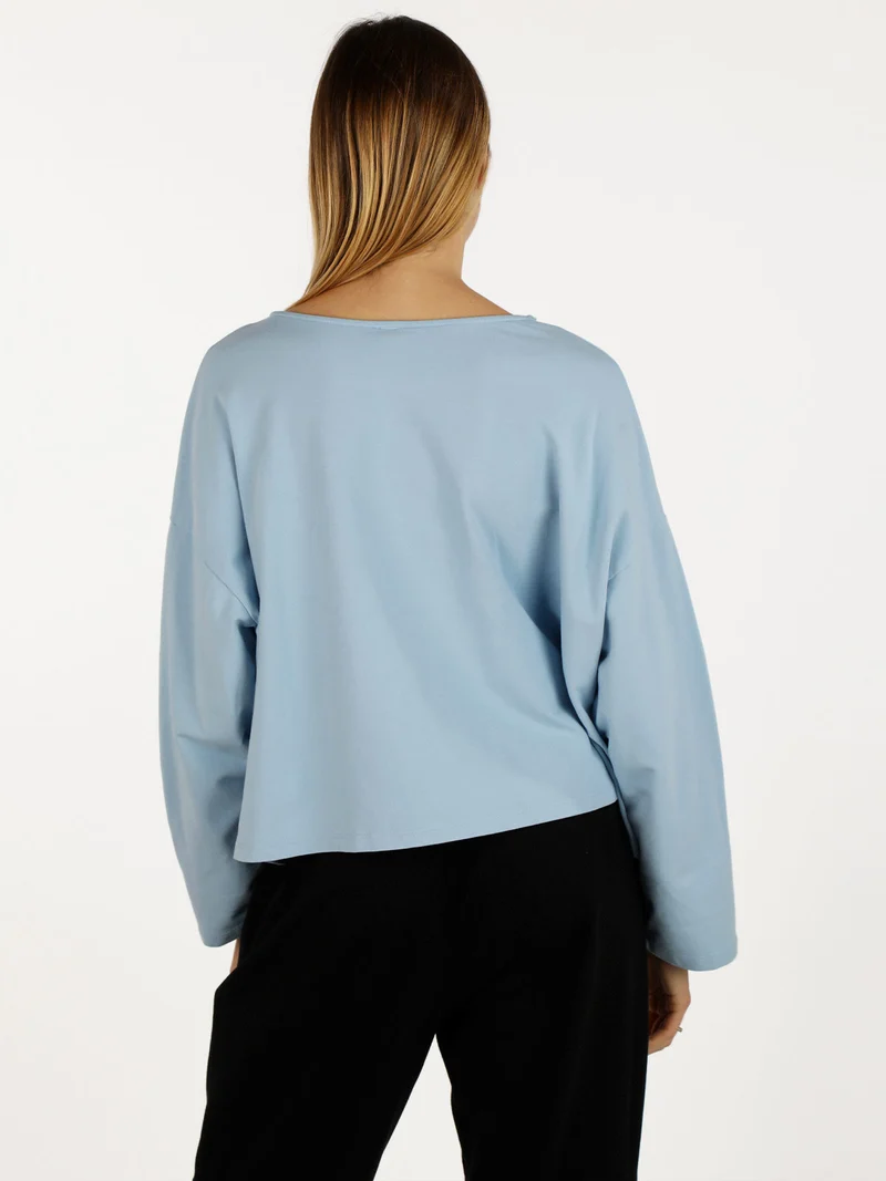 T-shirt cropped da donna con tasca - azzurro