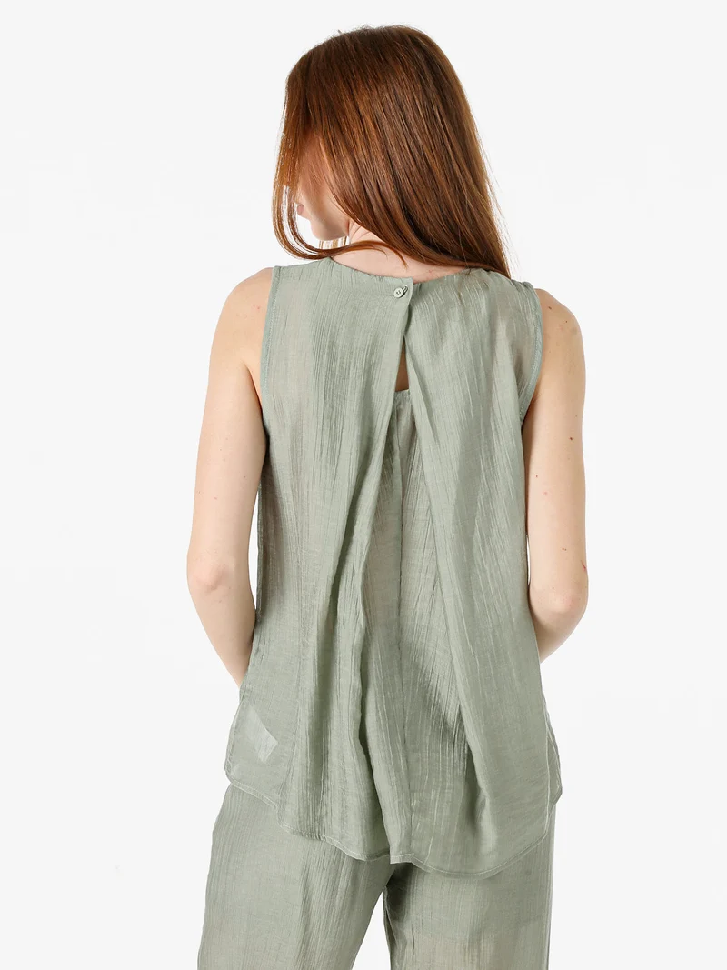 Top donna smanicato - pistacchio