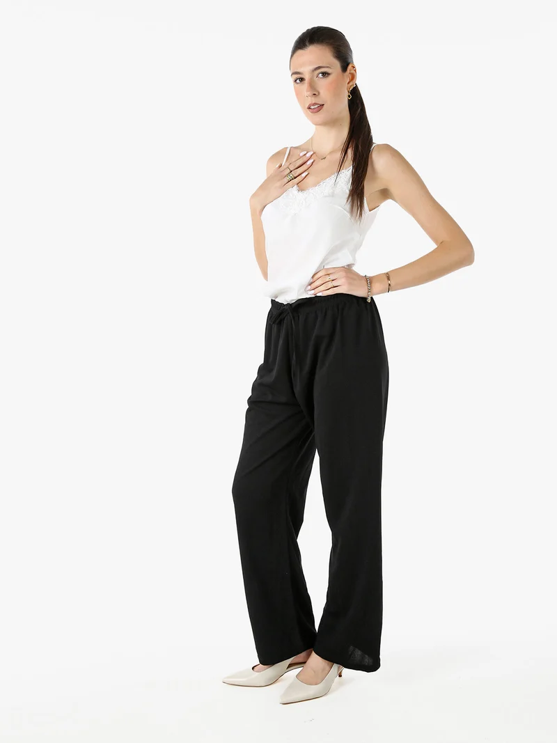 Pantaloni donna a gamba larga con coulisse - nero