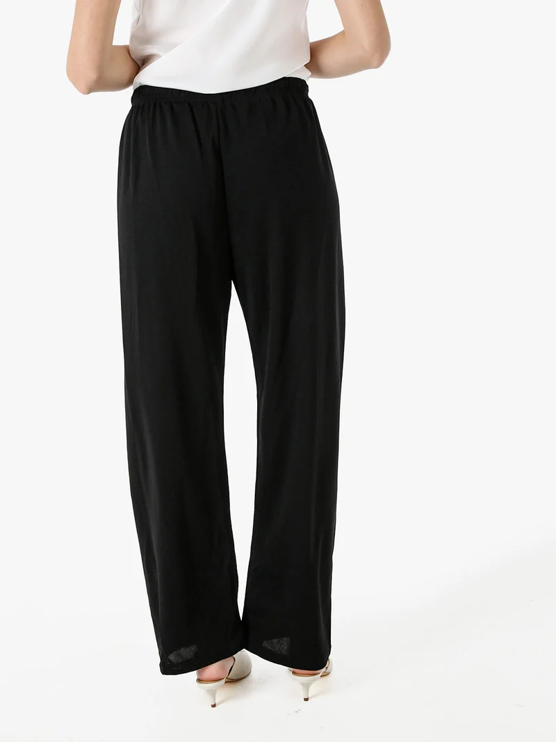 Pantaloni donna a gamba larga con coulisse - nero