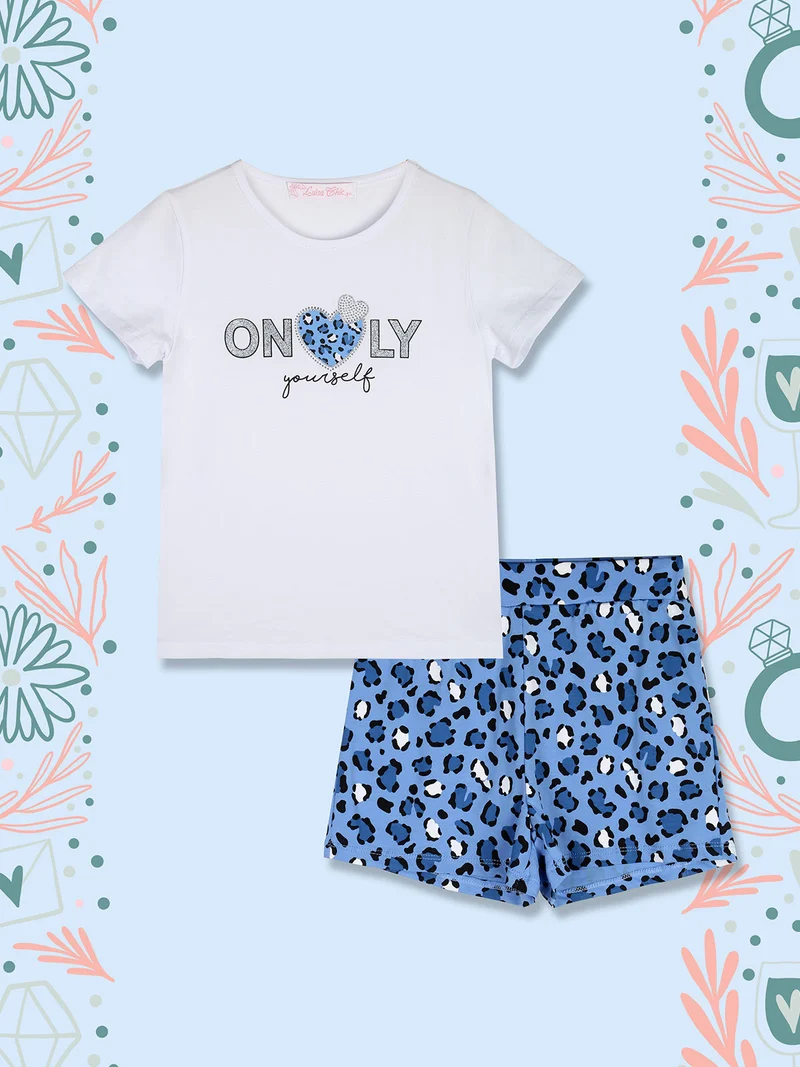 Completo corto da bambina con t-shirt e shorts maculati - bianco