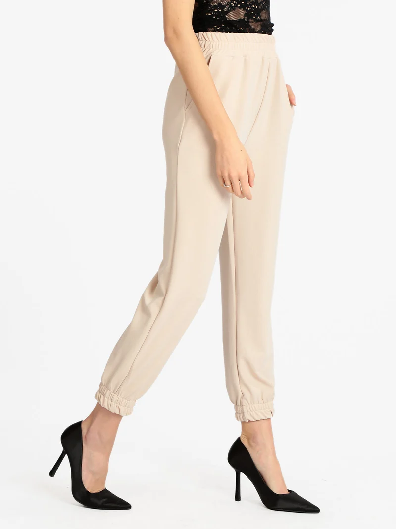 Pantaloni morbidi donna con polsino - beige