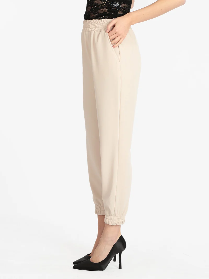 Pantaloni morbidi donna con polsino - beige