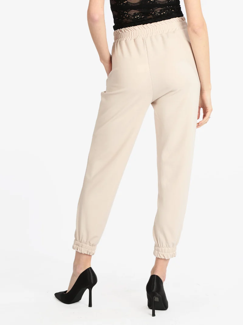 Pantaloni morbidi donna con polsino - beige