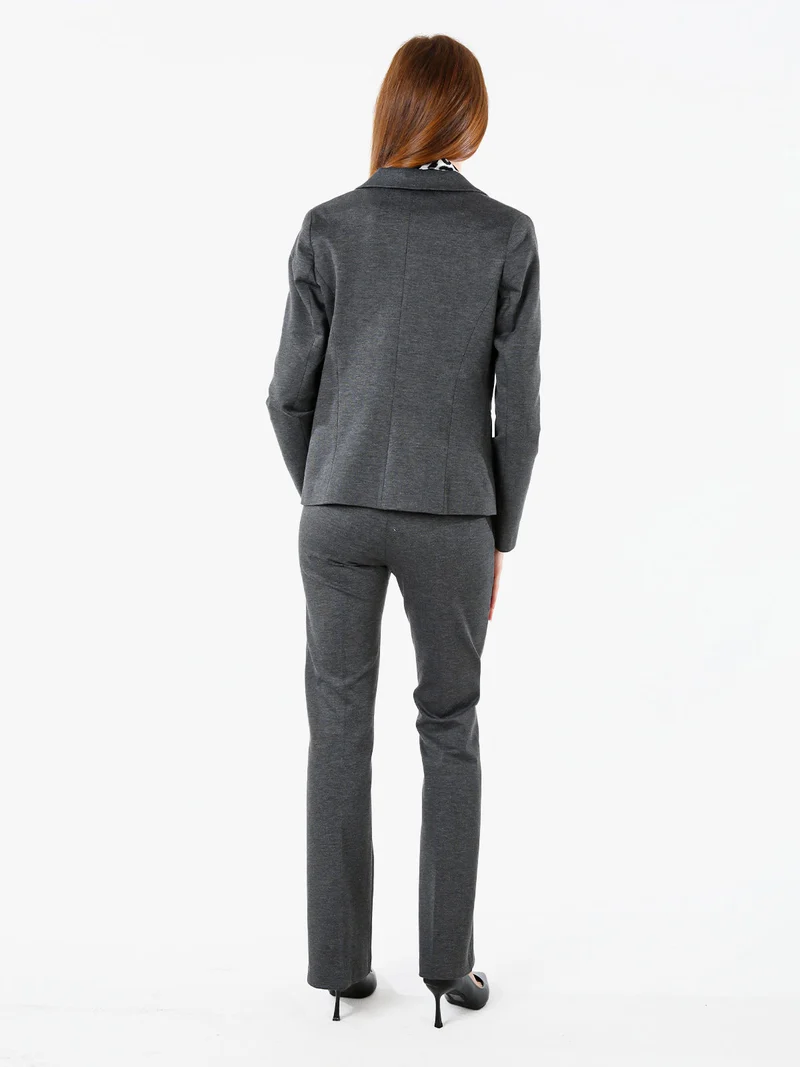 Completo elegante da donna con blazer e pantaloni con finale a zampa - grigio