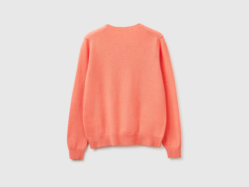 Pfirsichfarbene Strickjacke mit Rundhalsausschnitt aus reiner Merinowolle