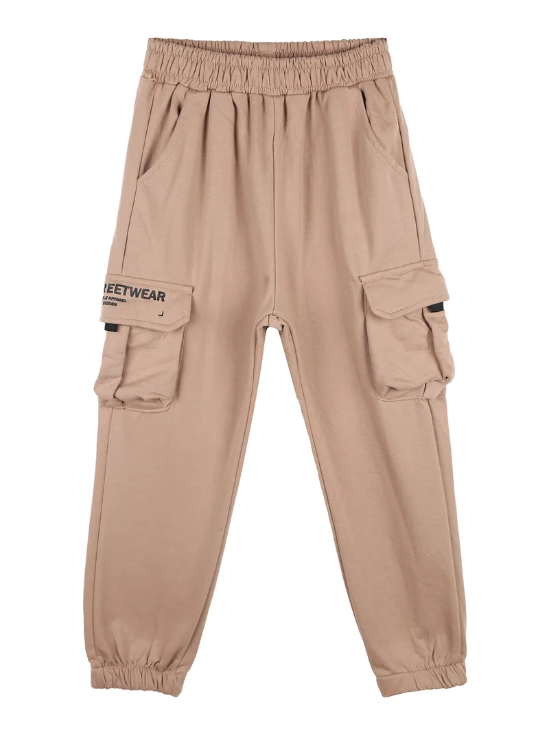 Pantaloni tuta da ragazzo con tasconi laterali - cammello