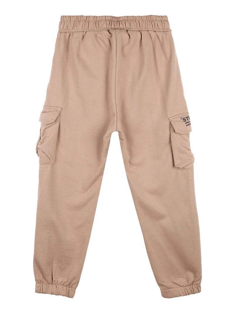 Pantaloni tuta da ragazzo con tasconi laterali - cammello