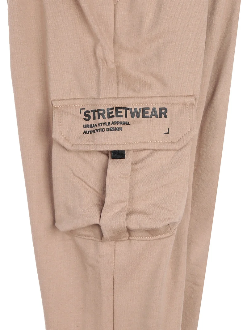 Pantaloni tuta da ragazzo con tasconi laterali - cammello
