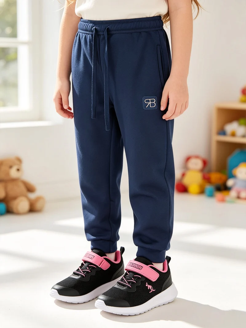 Pantaloni tuta felpati da bambina - blu scuro
