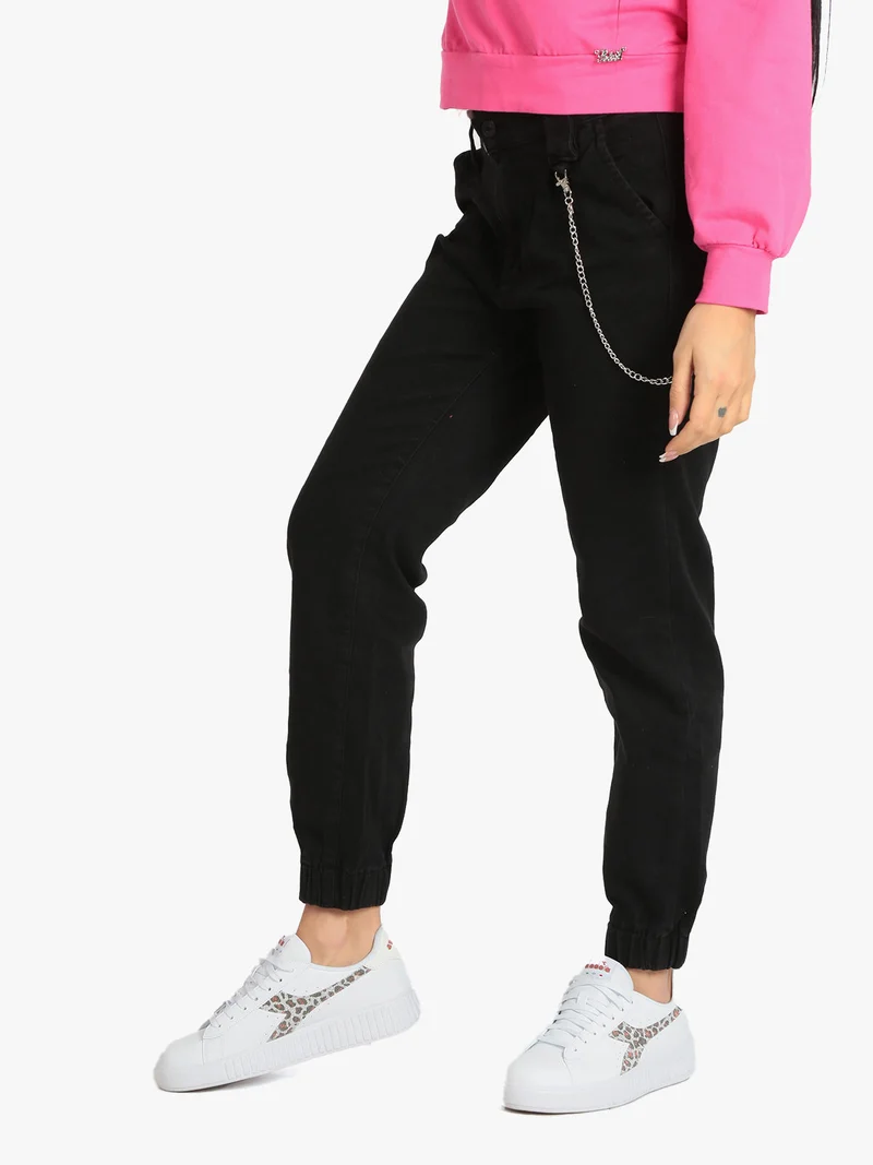 Jeans baggy da donna con catena - nero
