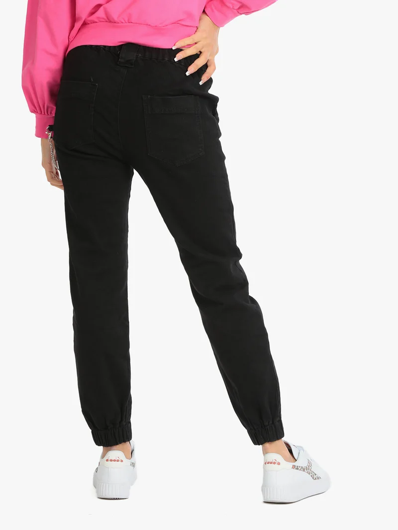 Jeans baggy da donna con catena - nero