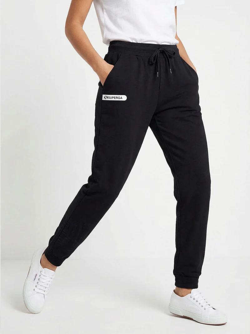 Pantaloni tuta da donna in felpa con coulisse e polsini - nero