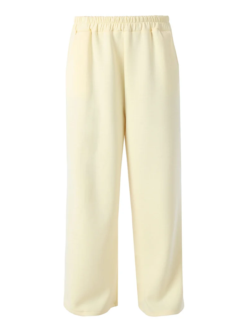 Pantaloni donna in felpa a gamba larga - giallo