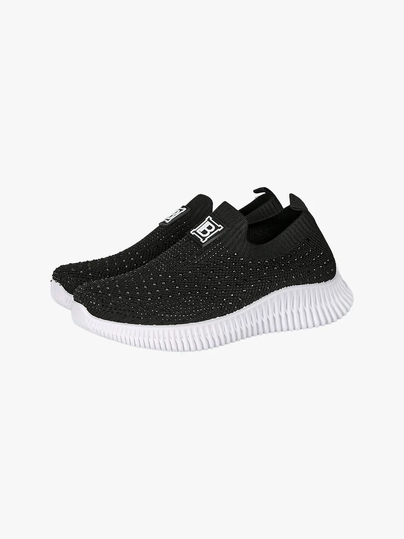 Sneakers donna slip on con borchie - nero